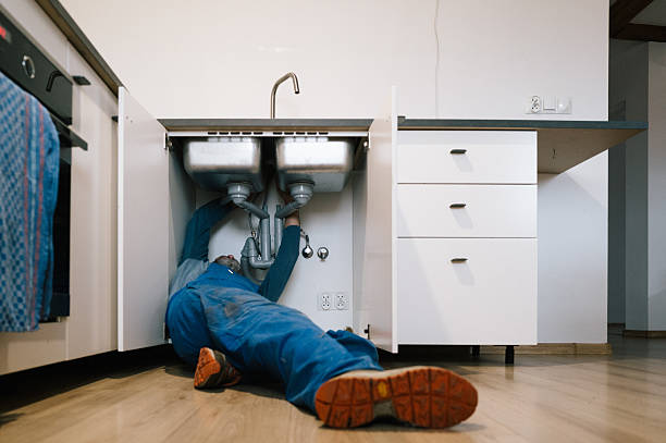Professional Emergency Plumber technician working in Bethpage, NY